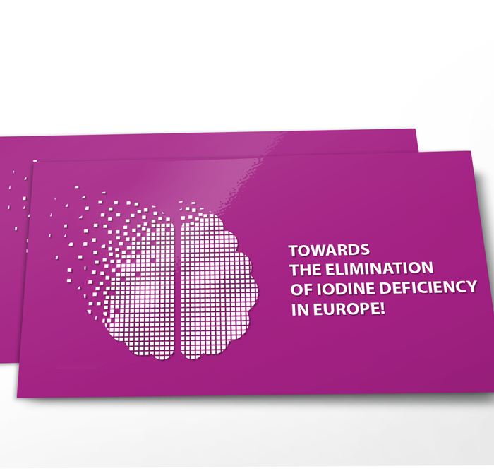 Postcard design for EUthyroid. The design is of a purple postcard with a pixelated brain on the left. The words read Towards the elimination of iodine deficiency in Europe.